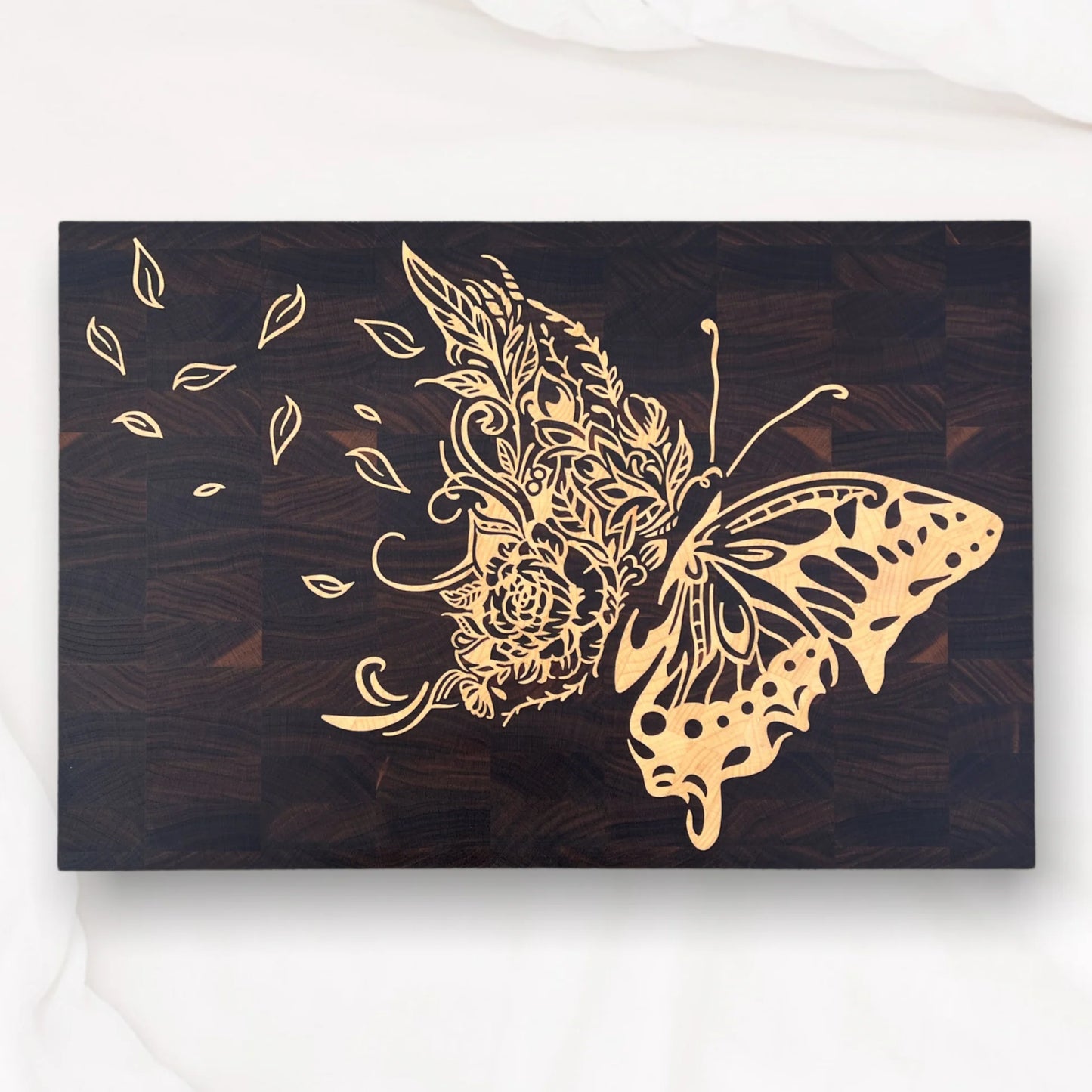 luxury walnut cutting board with maple butterfly inlay