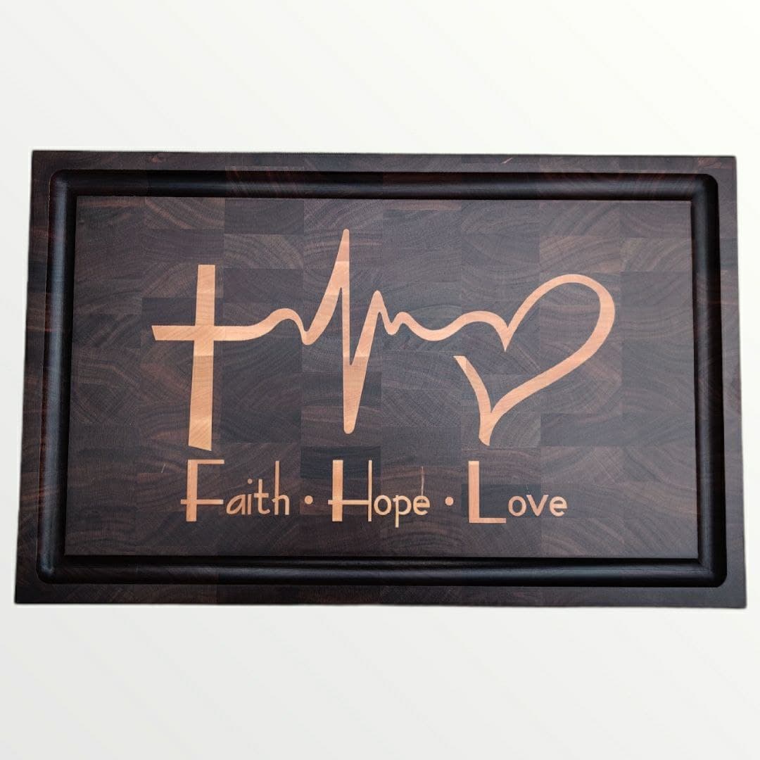Decorative tray with 'Faith Hope Love' design on a wooden background