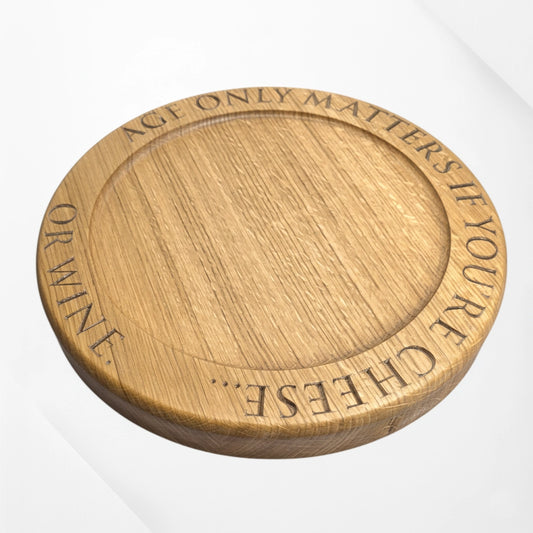 Engraved oak cheese board with quote ‘Age only matters if you’re cheese or wine’ – handmade solid oak serving board by The Crafty Oak.