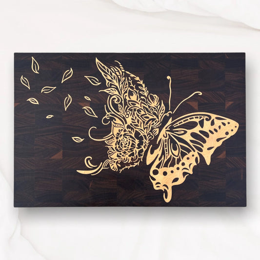 luxury walnut cutting board with maple butterfly inlay