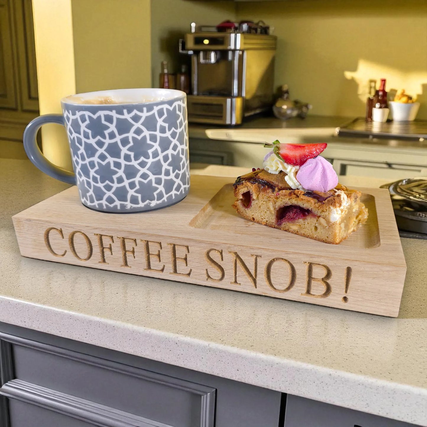 Personalised coffee and tea tray with ‘COFFEE SNOB!’ engraving on oak BrewBoard, mug and cake in kitchen