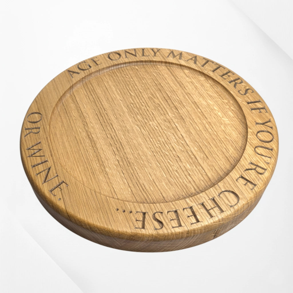 Engraved oak cheese board with quote ‘Age only matters if you’re cheese or wine’ – handmade solid oak serving board by The Crafty Oak.
