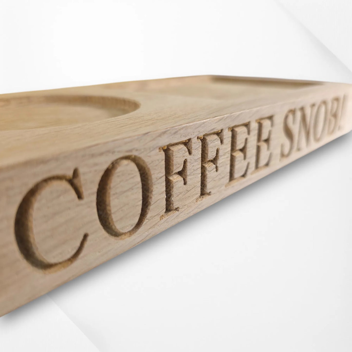 Close-up of engraved personalised oak coffee tray with ‘COFFEE SNOB!’ text