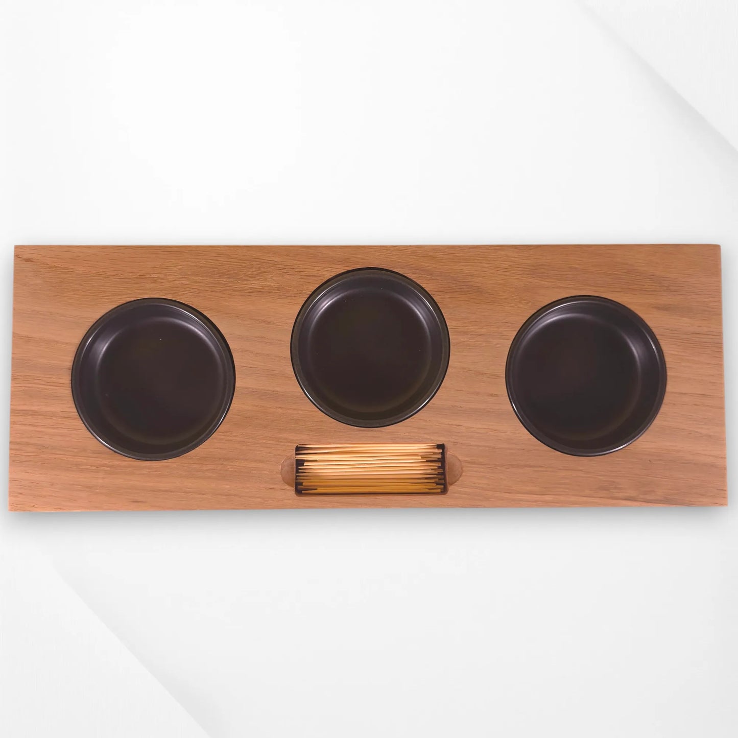 Top-down view of oak serving tray with three metal bowls and a built-in cocktail stick holder. Handmade wooden appetiser tray by The Crafty Oak.