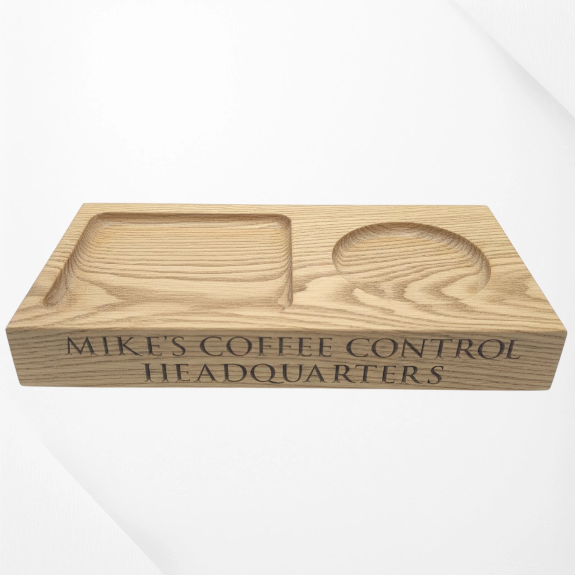 Personalised oak coffee tray engraved with “Mike’s Coffee Control Headquarters,” featuring carved sections for a mug and snacks.