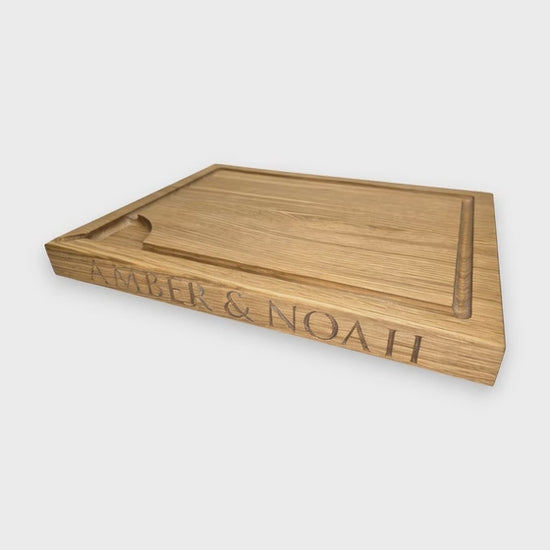 Rotating video of our carving board with Amber and Noah carved on the edge