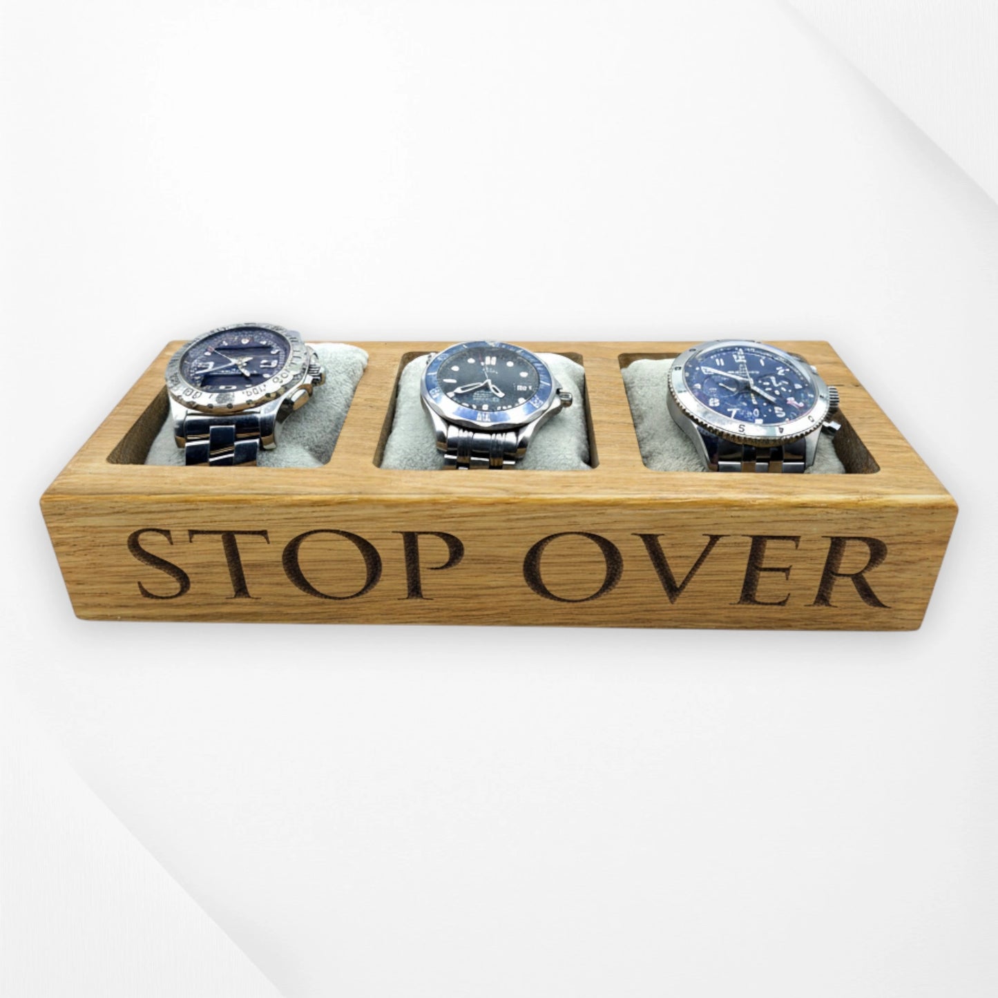 Three-slot personalised oak watch tray engraved STOP OVER holding watches